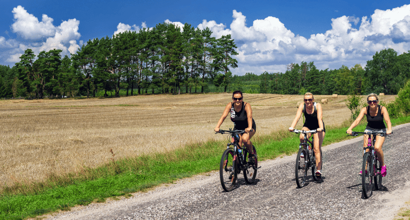 3 women on a biking trip in Danish nature
